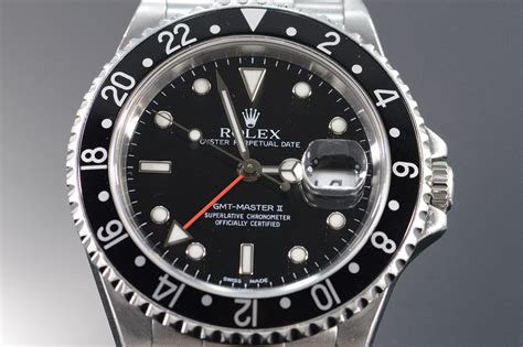 rolex with black face.